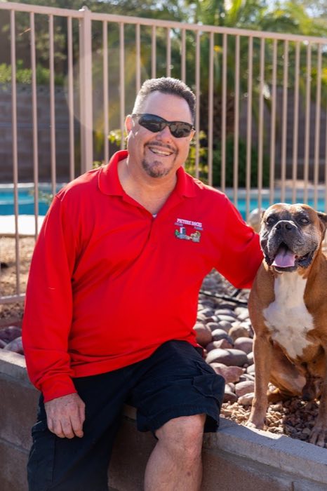 Picture Rocks owner with the company dog